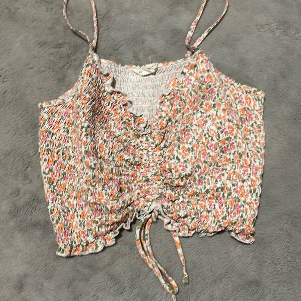 Cropped ripped tank top